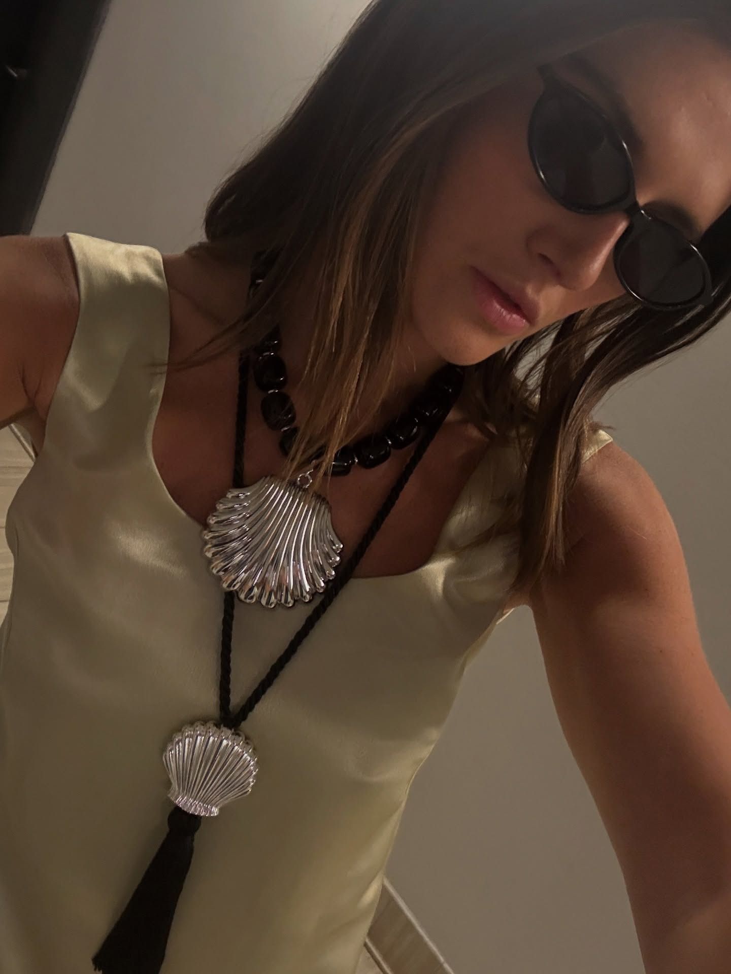 Best long necklaces: @cocoschiffer wears two long shell necklaces