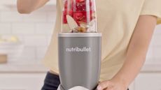Nutribullet 600 in silver blending a smoothie