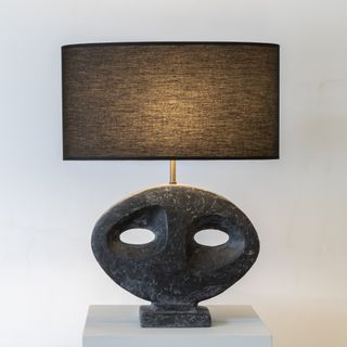 Ralph Pucci lamp with black sculptural base and brown shade