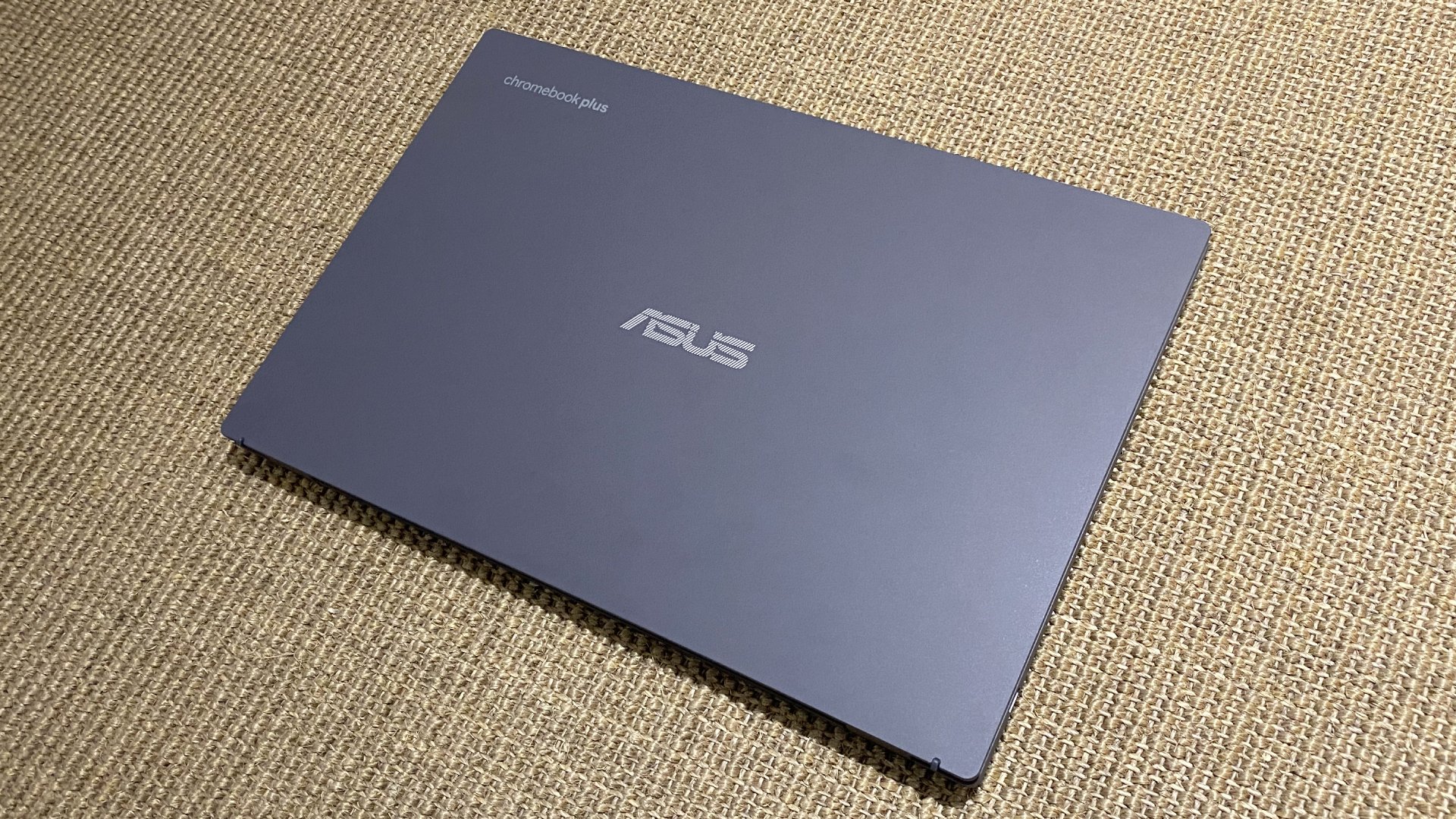 The Asus Chromebook Plus CX34 photographed with the lid closed.