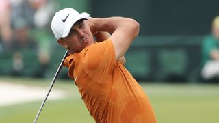 Brooks Koepka takes a shot during a practice round before the 2023 Masters