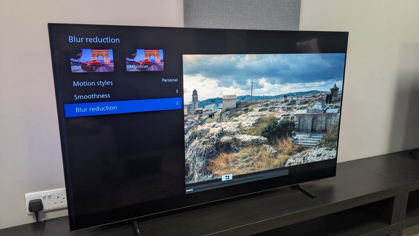 Philips OLED760 with motion smoothing menu on top of No Time To Die on screen 