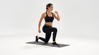Woman demonstrates reverse lunge exercise