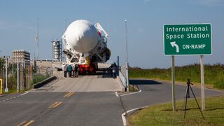 A Northrop Grumman Antares rocket carrying the Cygnus NG-16 resupply spacecraft arrives at the Mid-Atlantic Regional Spaceport's Pad-0A, on Aug. 6, 2021, at NASA's Wallops Flight Facility in Virginia.