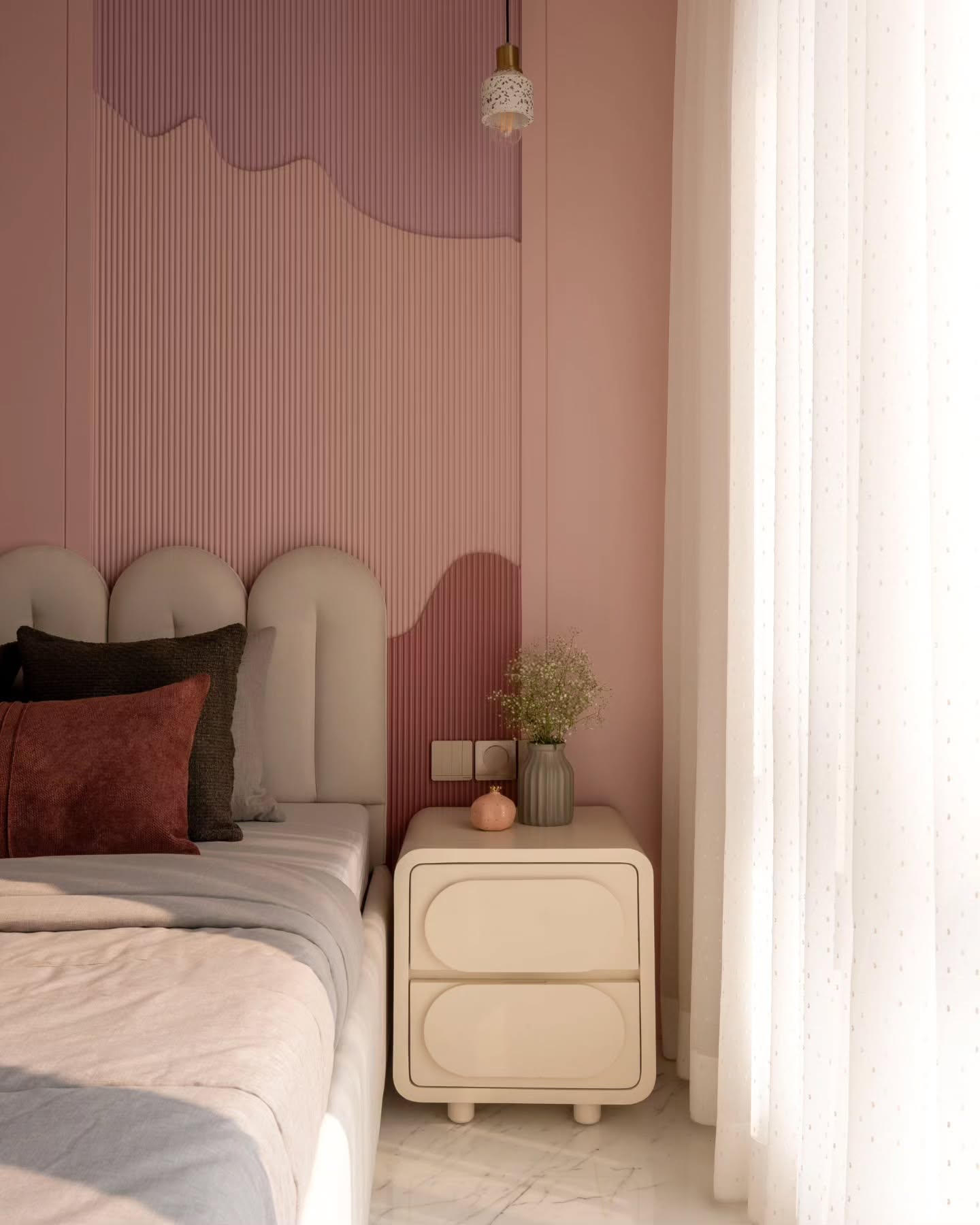 pink bedroom with fluted feature wall with boucle upholstered bedhead and white side table with sheer curtains