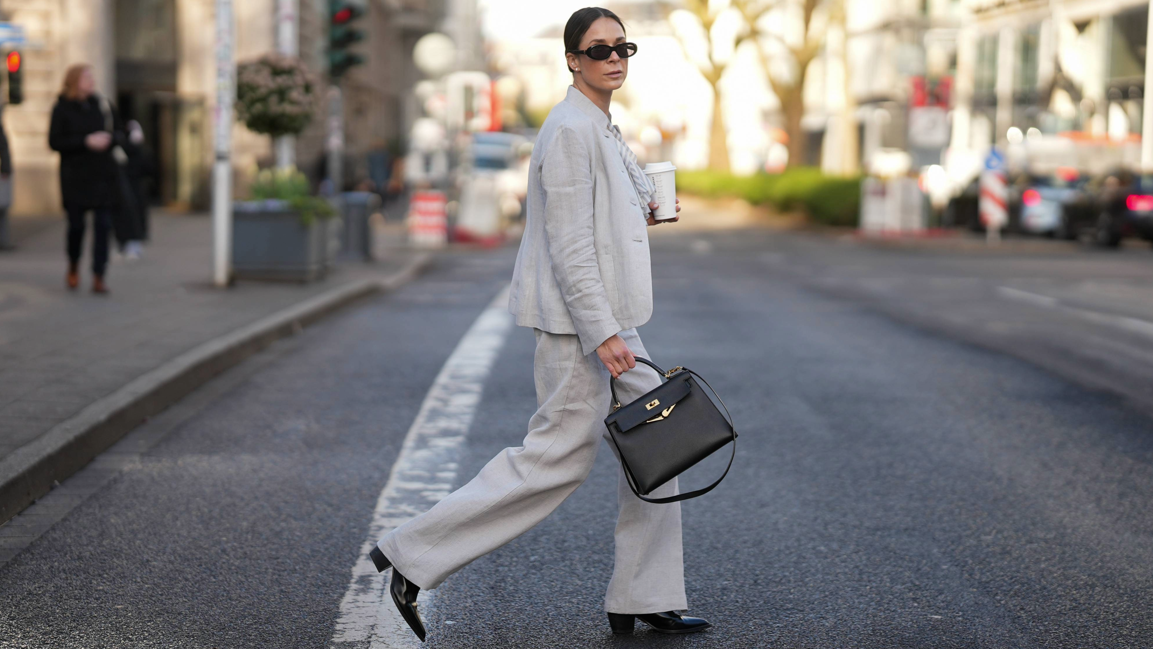 woman wearing a linen suit 