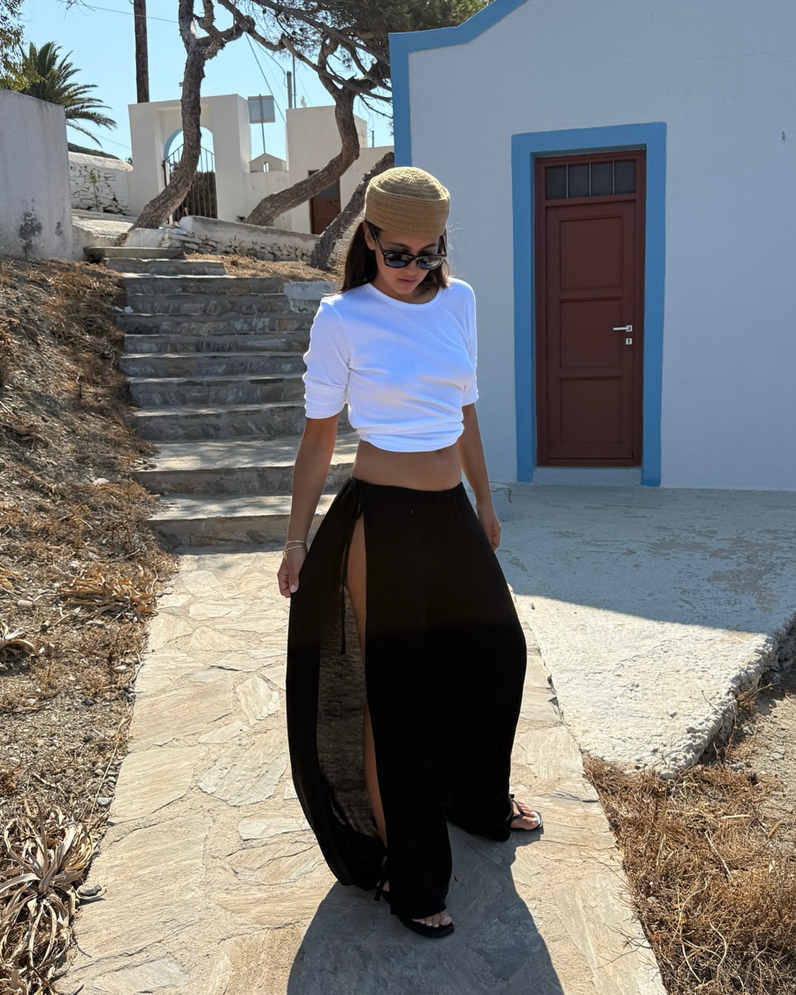 Fashion person wearing pants with a side slit.