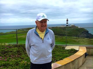 Old Head course designer, Ron Kirby, with the 18th hole in the background