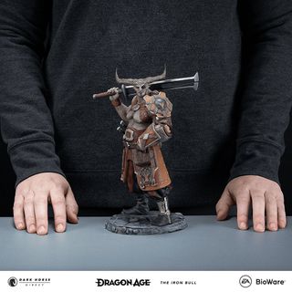 Iron bull statue to scale with human