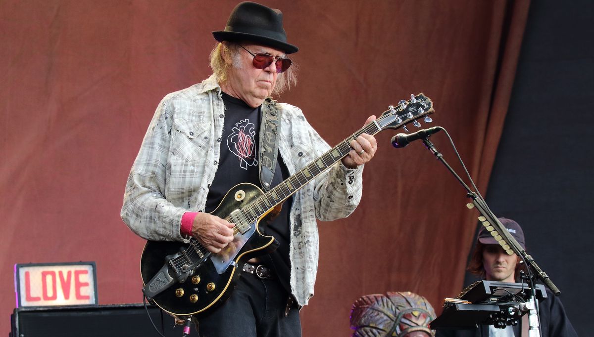 Neil Young showcases his savage overdriven tones and channels Hendrix in the most menacing solo rendition of the Star-Spangled Banner you’ve ever heard