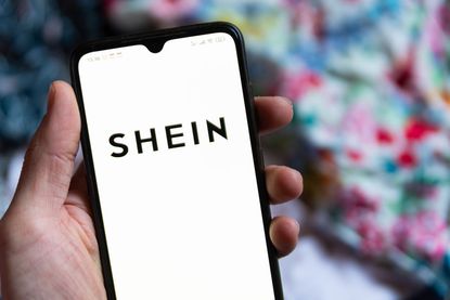 Shein logo displayed on smartphone