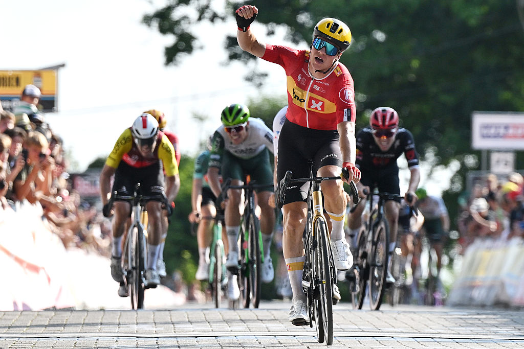 MONT-DE-L&#039;ENCLUS, BELGIUM - AUGUST 15: Jonas Abrahamsen of Norway and Team Uno-X Mobilit celebrates at finish line as race winner during the 84th Circuit Franco-Belge 2025 a 206.7km one day race from Tournai to Mont-de-l&#039;Enclus on August 15, 2025 in Mont-de-l&#039;Enclus, Belgium. (Photo by Luc Claessen/Getty Images)