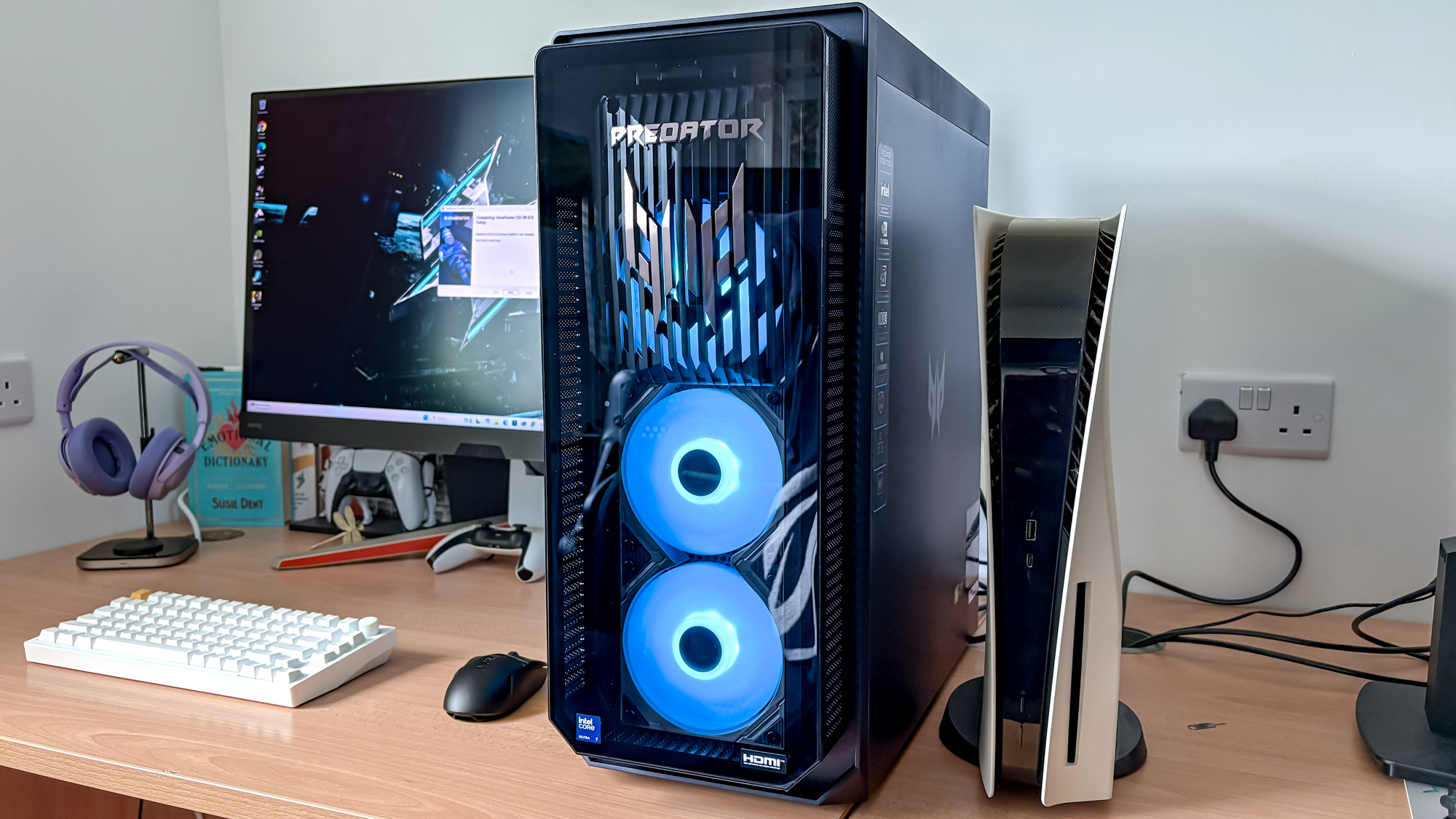 Acer Predator Orion 7000 on desk next to PS5 console