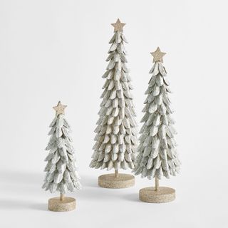 Group of three mini silver christmas trees