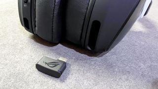 Asus ROG Delta S Wireless on a gray desk mat