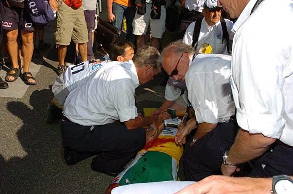 Thor Hushovd (CA) is attended to by doctors