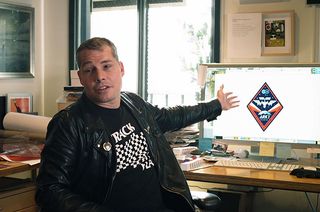 Artist Shepard Fairey showing an earlier concept for the mission patch he designed for the CASIS ARK1 science payloads.