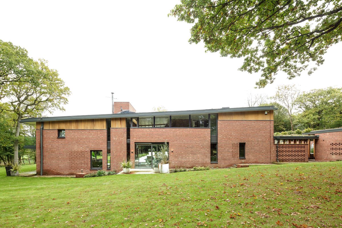 exterior of self-build with brick detailing
