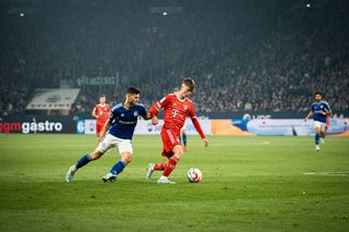 Paul Wanner of FC Bayern Muenchen controls the ball during the Bundesliga match between FC Schalke 04 and FC Bayern München at Veltins-Arena on November 12, 2022 in Gelsenkirchen, Germany.