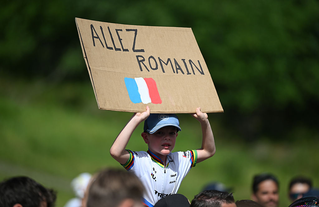 VALMEINIER 1800, FRANCE - JUNE 14: Fans of Romain Bardet of France and Team Picnic PostNL after the 77th Criterium du Dauphine 2025, Stage 7 a 131.6km stage from Grand-Algueblanche to Valmeinier 1800 (1830m) / #UCIWT / on June 14, 2025 in Valmeinier 1800, France.