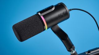 the hyperx flipcast streaming microphone on a boom arm with an RGB LED panel and an xlr and usb-c connectivity