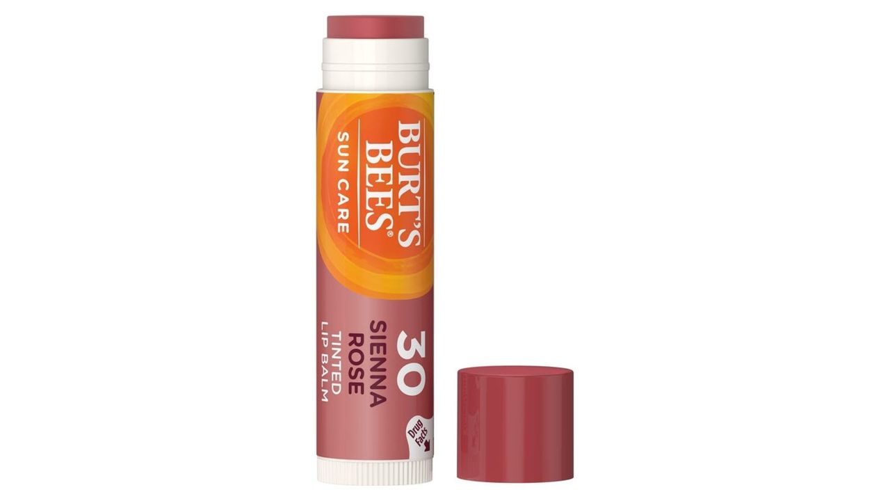 A plum colored urt's Bees SPF 30 Sun Care Tinted Lip Balm for the best SPF lip balm.