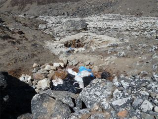 Human waste gets bagged up and thrown in riverbeds and then gets washed downstream during monsoon season in the summer.