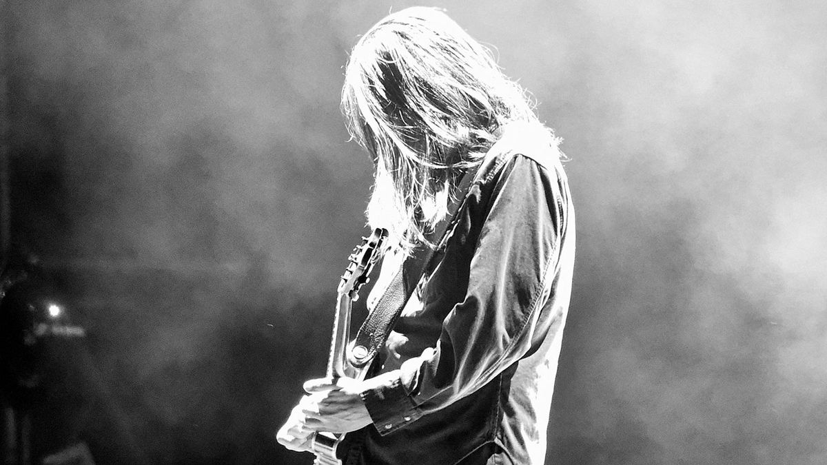 Adam Jones of Tool, performing in 2017