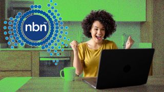 Woman excited at computer with NBN logo to her left