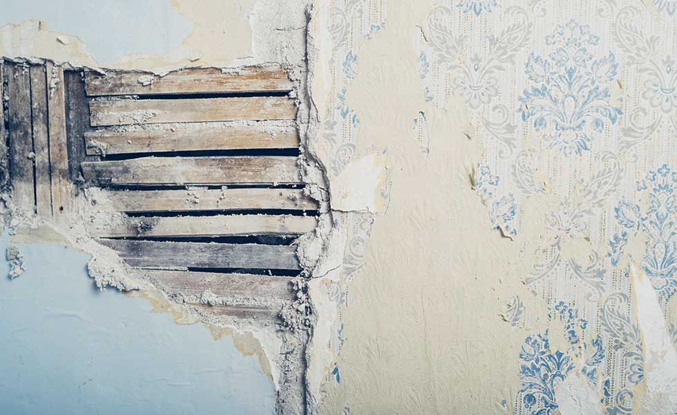 Plaster Repair How To Fix S Bulges Loose And Damp Real Homes - How To Repair Deep Holes In Plaster Walls Uk