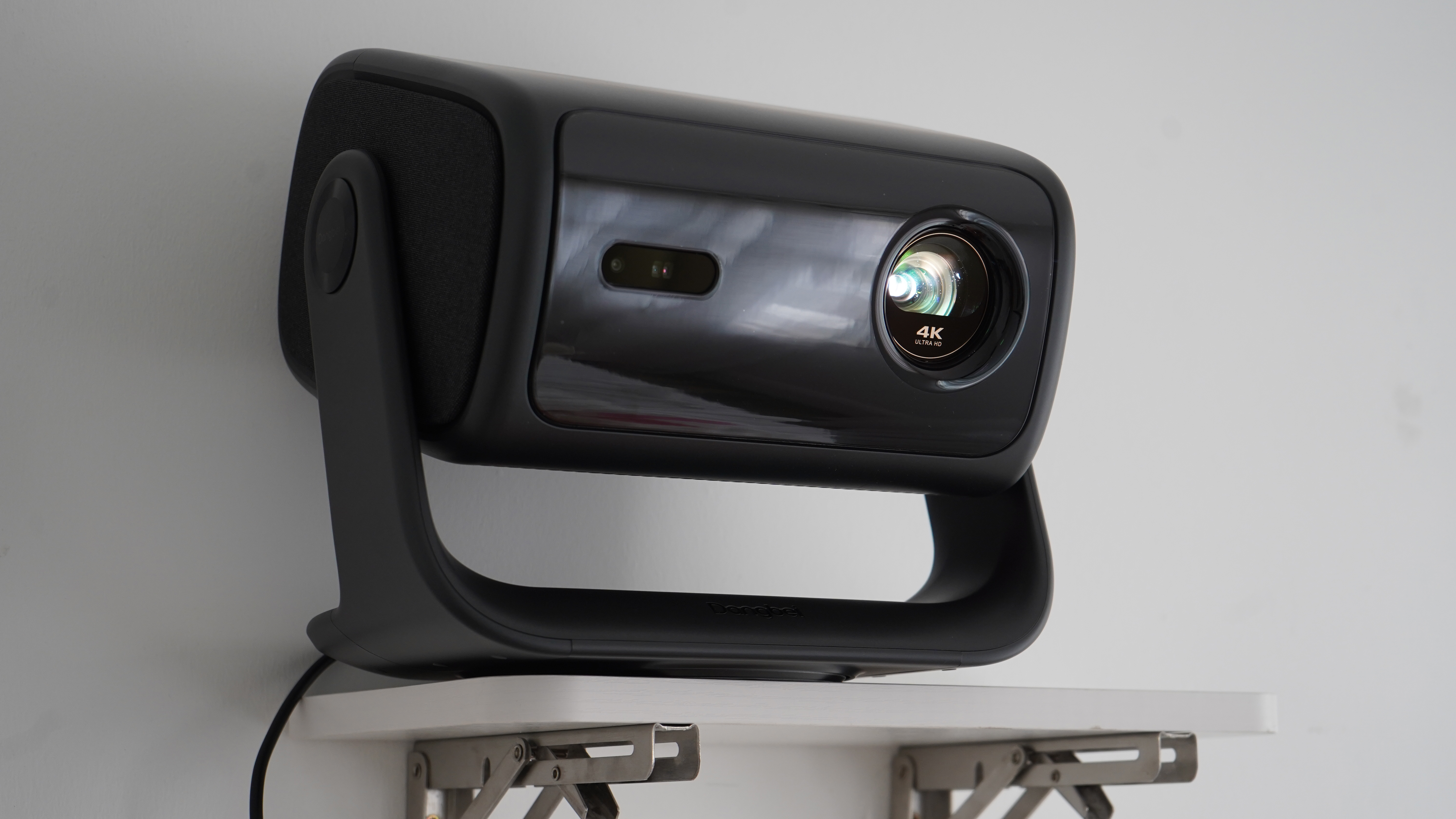 Dangbei MP1 Max projector on shelf