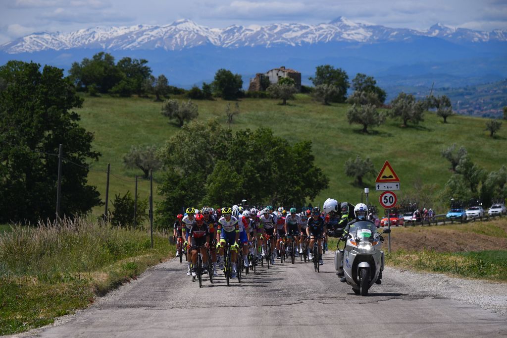 The pack rides through the countryside during the seventh stage of the Giro dItalia 2021 cycling race 181 km between Notaresco and Termoli on May 14 2021 Photo by Dario BELINGHERI AFP Photo by DARIO BELINGHERIAFP via Getty Images