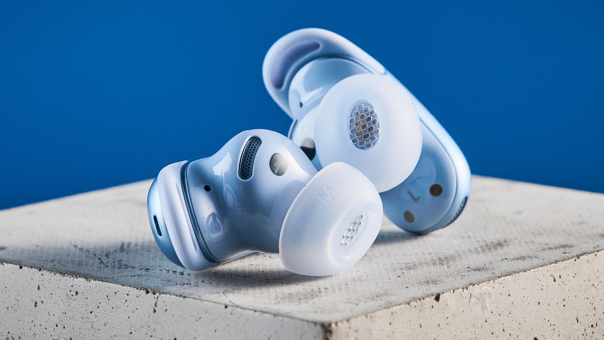 the soundcore liberty 5 pro in blue on a blue tom's guide background