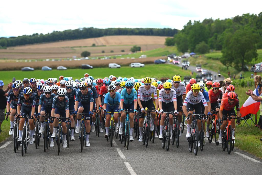 DIJON FRANCE JULY 04 LR Bob Jungels of Luxembourg Matteo Sobrero of Italy Primoz Roglic of Slovenia Jan Tratnik of Slovenia Wout Van Aert of Belgium and Team Visma Lease a Bike Jarrad Drizners of Australia and Team Lotto Dstny Mark Cavendish of The United Kingdom Michael Morkov of Denmark and Astana Qazaqstan Team Tim Wellens of Belgium Pavel Sivakov of France Marc Soler of Spain and UAE Team Emirates Fernando Gaviria of Colombia and Movistar Team Michal Kwiatkowski of Poland and Nicolas Jonathan Castroviejo of Spain and Team INEOS Grenadiers and a general view of the peloton competing during the 111th Tour de France 2024 Stage 6 a 1635km stage from Macon to Dijon UCIWT on July 04 2024 in Dijon France Photo by Dario BelingheriGetty Images