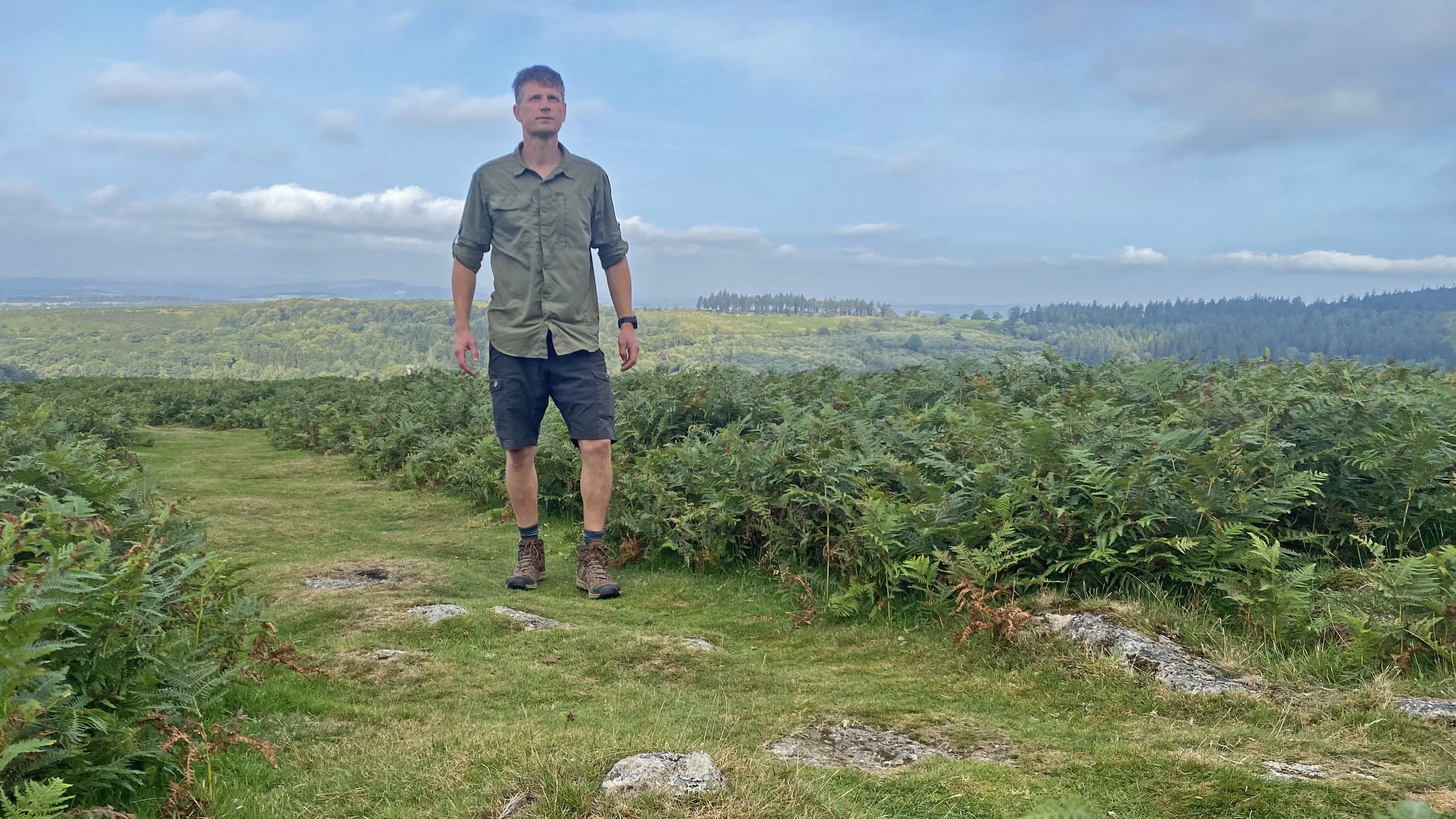 A hiker wearing the Columbia Skien Valley shirt on Dartmoor