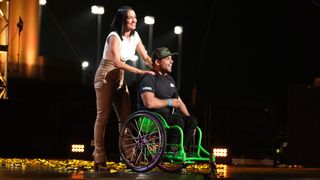 'America's Got Talent Extreme' judge Nicki Bella hugs contestant Aaron Wheelz after awarding him her Golden Buzzer.