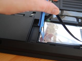Press the HDD mount clip