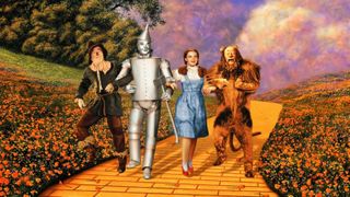 tin man scarecrow dorothy and the lion walking down the yellow brick road in The Wizard of Oz