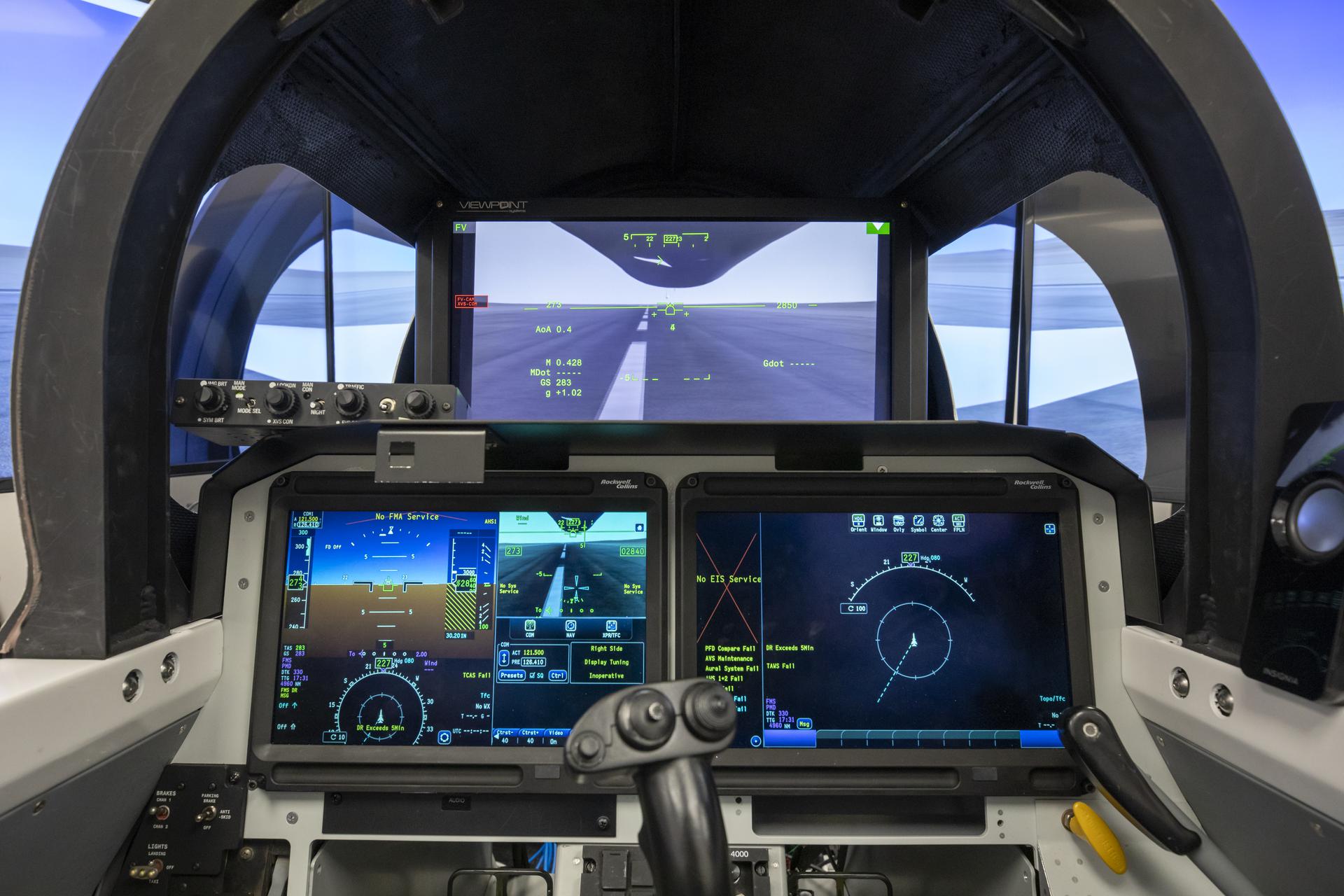 a computer screen inside an aircraft cockpit