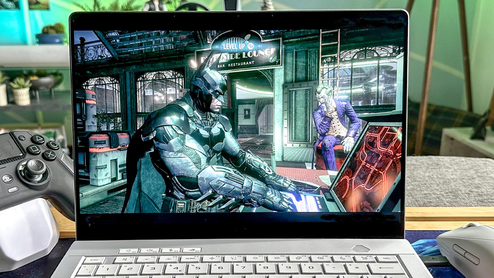 ROG Zephyrus G14 gaming laptop playing Batman Arkham Knight.