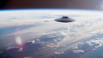 A stock photo of a UFO hovering above the Earth.