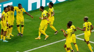 Ecuador players celebrate after Enner Valencia scored the opening goal (a penalty) against Qatar in the first game of the FIFA World Cup 2022 on 20 November, 2022 at Al Bayt Stadium, Qatar