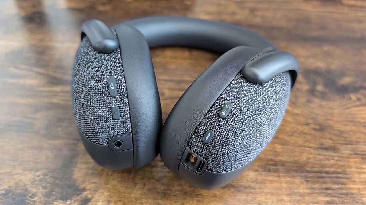 Closeup of the mic mute, Bluetooth/power buttons on the Dell Premiere Wireless ANC WL7024 headset.
