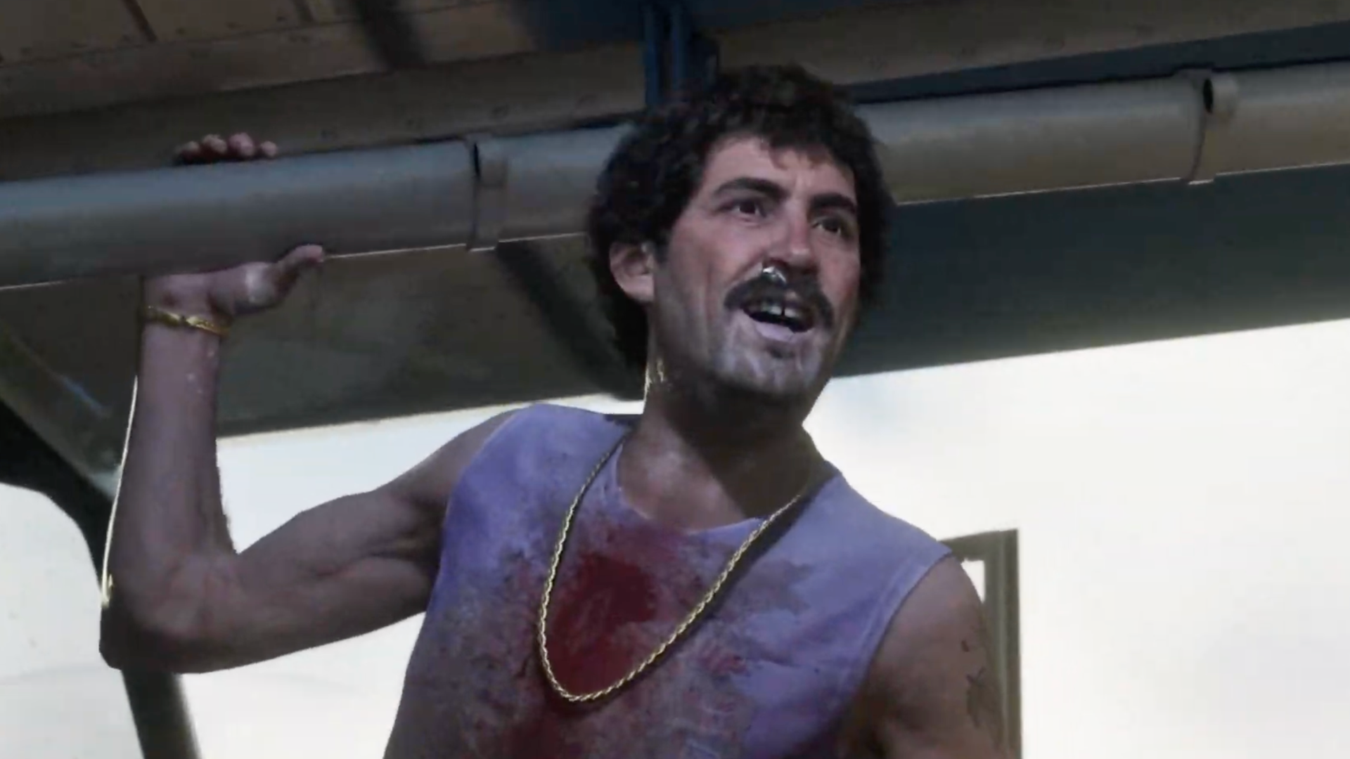 Man covered in blood smiles