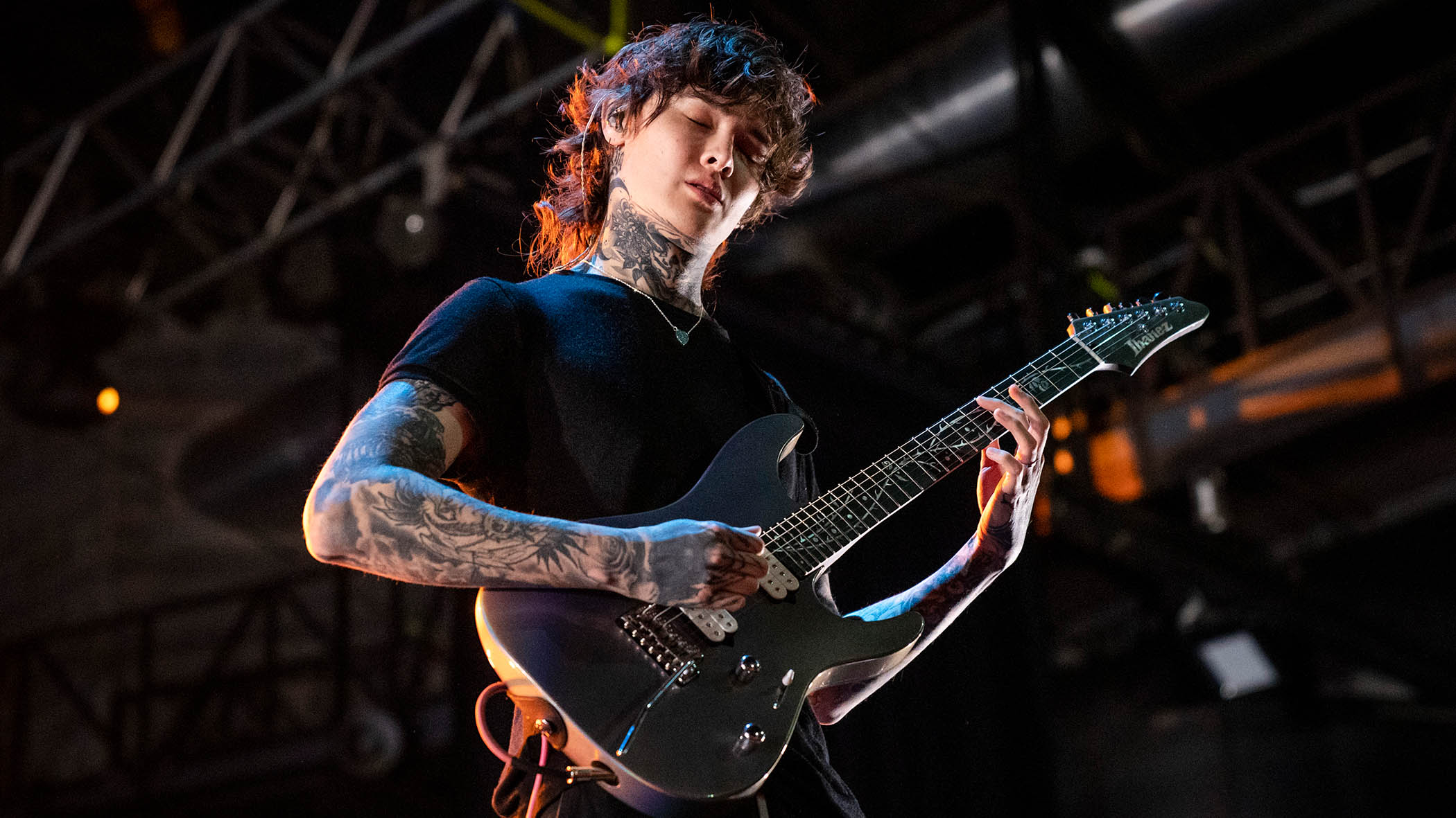 Tim Henson of Polyphia performs live in Italy in 2023.