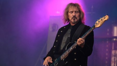 Geezer Butler performs on stage during day one of High Voltage Festival at Victoria Park on July 24, 2010 in London, England