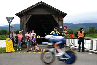 VADUZ LIECHTENSTEIN JUNE 09 Rider detail view of Team dsmfirmenich PostNL sprints while fans cheers during the 87th Tour de Suisse 2024 Stage 1 a 477km individual time trial stage from Vaduz to Vaduz UCIWT on June 09 2024 in Vaduz Liechtenstein Photo by Tim de WaeleGetty Images