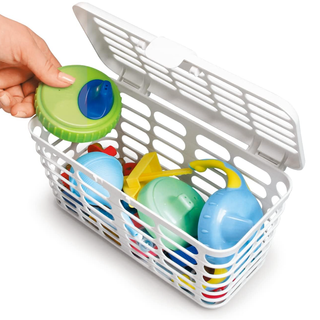 a white metal dishwasher basket filled with toddler drink lids