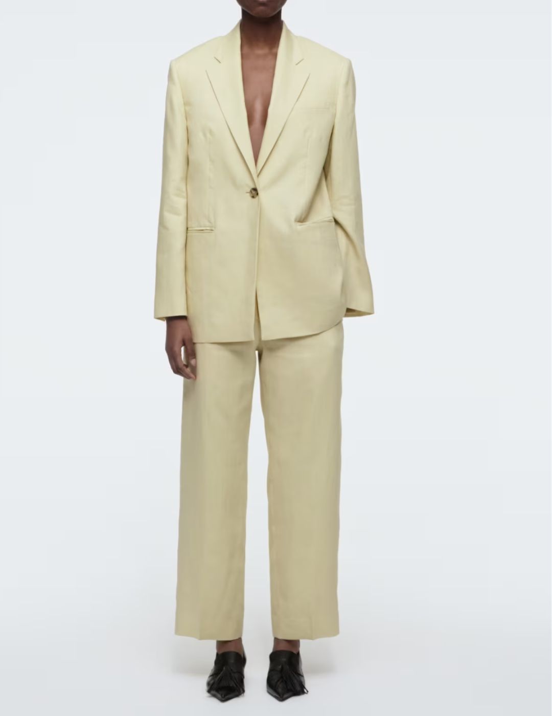 Image of butter yellow suit