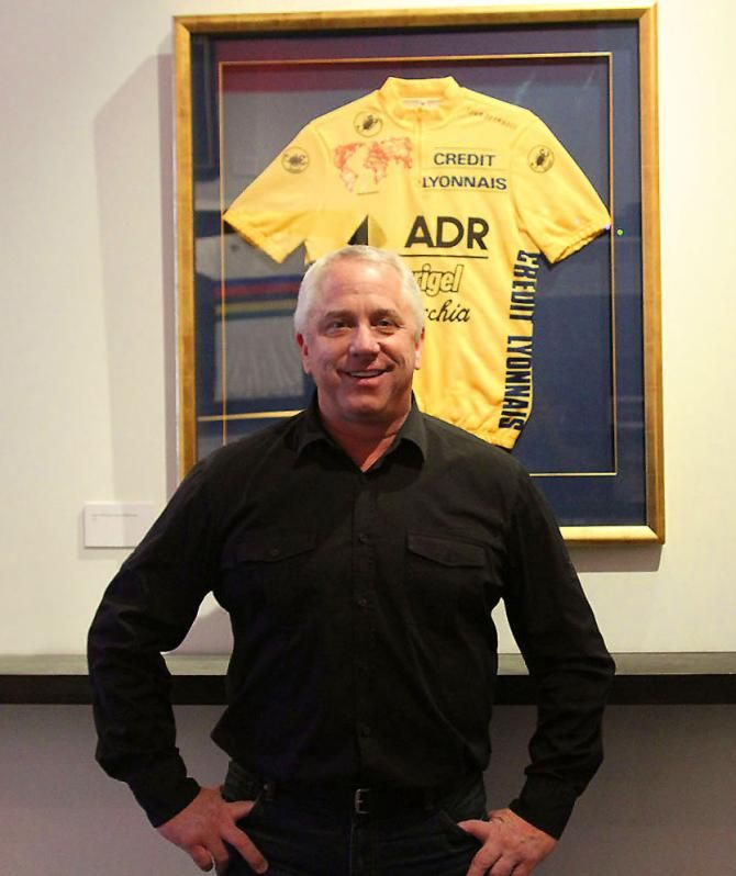 Three-time Tour de France champion Greg LeMond with one of his yellow jerseys